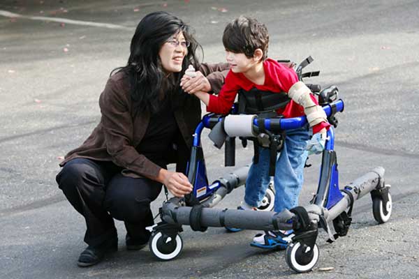 child using walking device